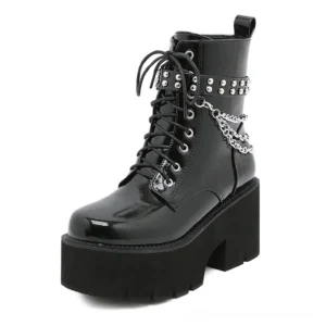 Single black gothic platform boot displaying side profile with hanging metal chain, studs, and block heel on thick lug sole