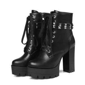 Black leather gothic platform combat boots with pyramid studs and lace-up design, front view