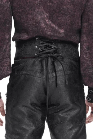 Back lace-up closure of black gothic corset belt with embossed brocade fabric and lace trim edges