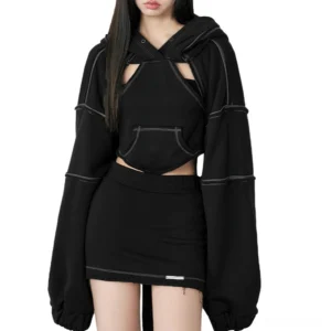 Black gothic hollow-out crop hoodie front view on model showing chest cutout detail and cropped silhouette
