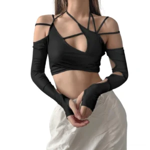 Black asymmetrical cutout crop top with long sleeves on female model, front view showing crisscross halter straps and hollow-out shoulder details