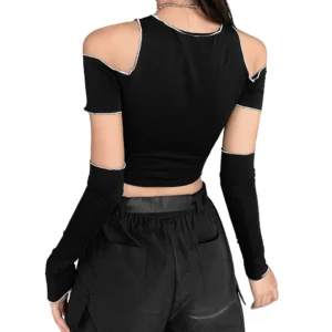 Back view of black gothic cutout shoulder crop top, detachable sleeves attached, slim fitted silhouette on model