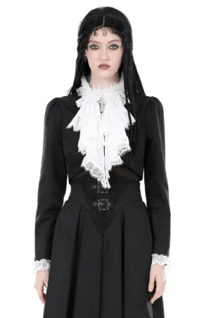 Black cropped gothic lace jacket with white ruffle jabot collar worn by model, front full-body view showcasing waist cutout and fitted silhouette