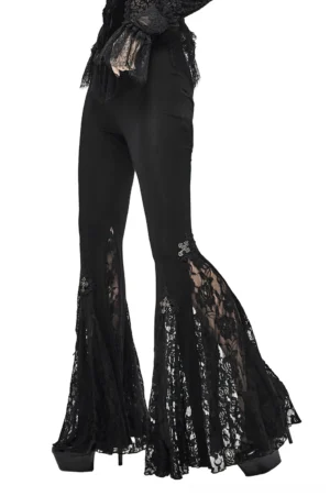 Black gothic lace flare leggings worn by female model, side profile view showcasing high waist and floral lace bell-bottom hem with metal cross accents