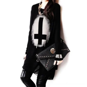 Black gothic chiffon batwing tunic top with white cross print, front oblique view on model, asymmetrical high-low hem, long sleeves