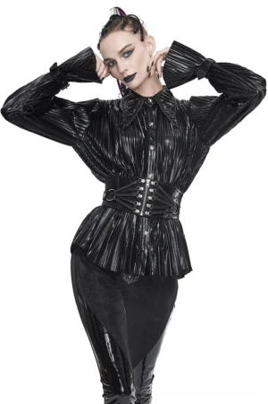 Black pleated gothic cyberpunk blouse with pointed collar and dramatic ruffle sleeves, worn by female model in front three-quarter view with corset waist belt detail