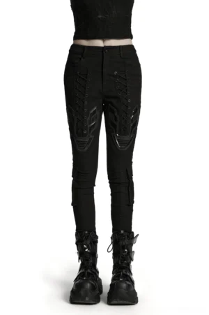 Black gothic cyberpunk cargo trousers with 3D armor patches front view on model, featuring lace-up front and tactical design