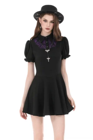 Black gothic mini dress front view with purple lace yoke and puff sleeves
