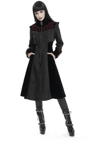 Black gothic floral embroidered stand collar coat front view on model, showing structured silhouette and red paisley embroidery details