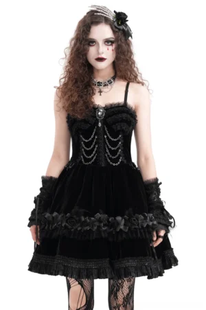 Black velvet gothic evening dress with ornate lace and chain details - front view on model