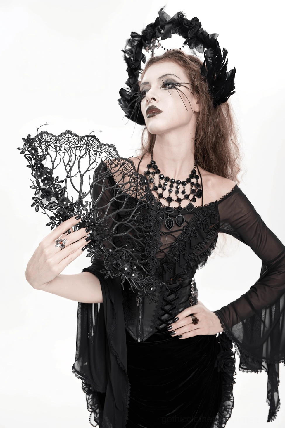 Black gothic lace hand fan with Victorian floral branch design and refined lace border details