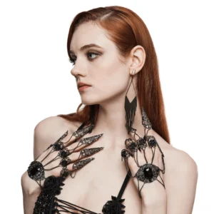 Gothic finger hand chain with rose buckle and claw nail tassel worn on model's left hand, side profile view with black filigree metalwork and faceted gemstone center