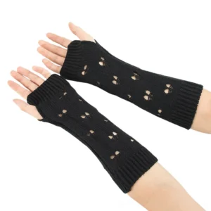 Black gothic fingerless gloves flat lay view on white background, featuring elegant hollow heart cutouts and elastic ribbed cuffs