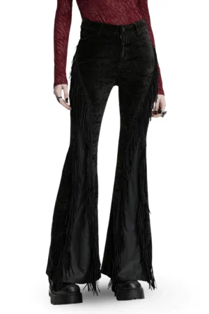 Black gothic flare pants with cascading tassel fringe and velvet detailing, front view on model