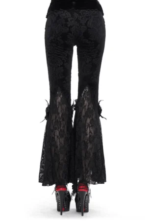 Black damask lace gothic flared pants back view showing sheer lace legs, model wearing platform heels on white background