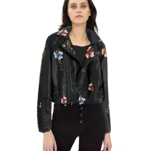 Women's black floral embroidered faux leather gothic motorcycle jacket front view on model - asymmetrical zipper, studded details, cropped biker fit