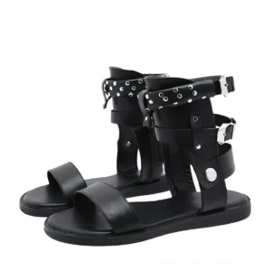 Black gothic gladiator sandals with metal rivets and adjustable ankle straps front view