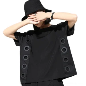 Black gothic grommet t-shirt front view with metal eyelets on both sides, featuring alternative fashion design and round neckline