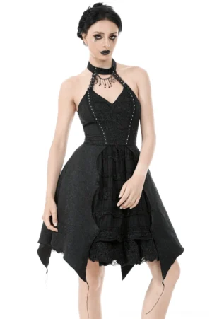 Black gothic halter corset dress with beaded choker and asymmetrical hem, front view on model