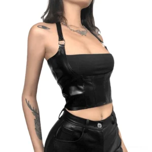 Black gothic halter crop top with buckle straps worn by female model, front three-quarter view demonstrating adjustable halter design and faux leather corset construction