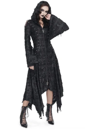 Black distressed gothic hooded trench coat with irregular hem on female model, front three-quarter view showing studded details and tattered asymmetric hemline