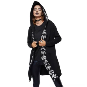 Black gothic hooded long coat with white occult prints, front three-quarter view on model with dark makeup and goth styling