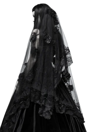 Back view of black gothic bridal veil displaying layered lace edges and floral decorations, worn by model