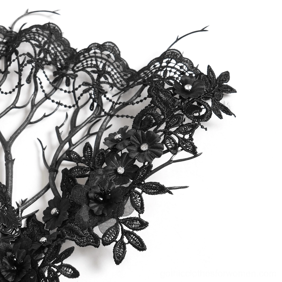 Complete view of black gothic lace hand fan showcasing full filigree pattern, floral branch skeleton, and dark aesthetic