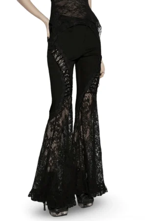 Black lace flared denim pants side view on model, showing sheer lace panel detail and Victorian gothic styling