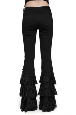 Black gothic lace flared pants rear view on model displaying layered lace hem flare and back pocket details