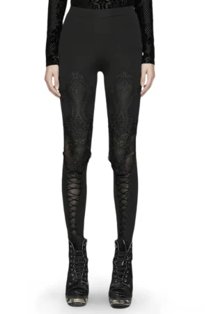 Black gothic lace leggings front view with ornamental lace decals on model wearing complete dark outfit
