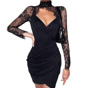 Black gothic lace mini dress with long sleeves and hollow-out neckline detail on model, three-quarter side view showcasing slim silhouette and asymmetrical wrap front