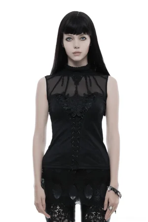 Black gothic lace tank top with high mock neck collar and embroidered lace front detail, worn by female model in front full-body view against white studio background