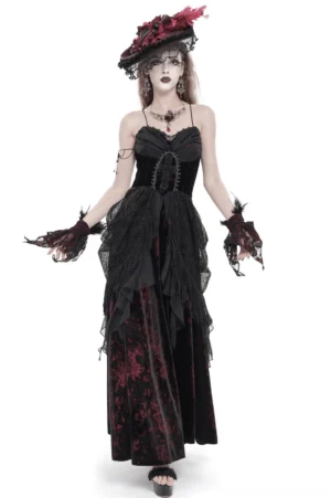Black gothic lace-up corset dress with layered tulle ruffles, front full view on model