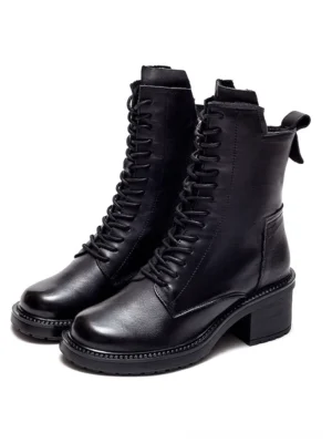 Black gothic lace-up genuine leather ankle boots with square heel, front view on white background