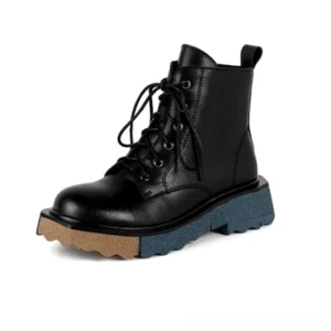 Women's black leather gothic platform ankle boots, lace-up and side zipper closure, genuine leather construction, front three-quarter view