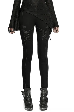 Black gothic lace-up skinny jeans front view on model, full-body display of punk-inspired women's denim with thigh lacing details
