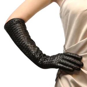 Side profile view of black woven leather gloves on model arm, showcasing full-length coverage and textile detail