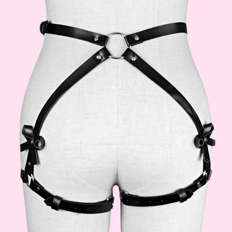 Black leather leg harness with adjustable cross straps and decorative bows, gothic body harness accessory for women