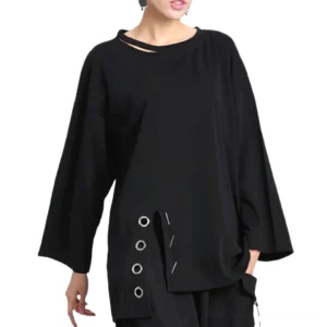 Black gothic casual long sleeve ladies top featuring neck cutout and asymmetric hem with eyelet trim details, front medium shot on model