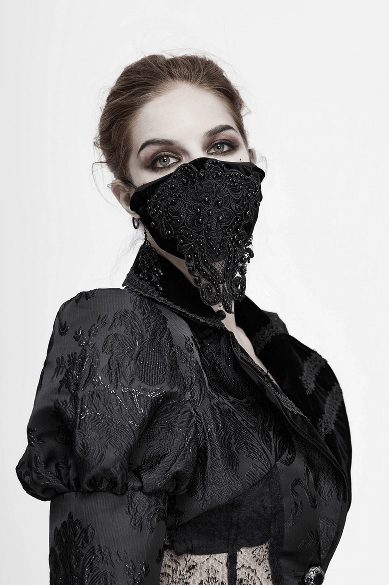 Gothic black lace mask texture close-up highlighting premium velvet finish and lace embellishment