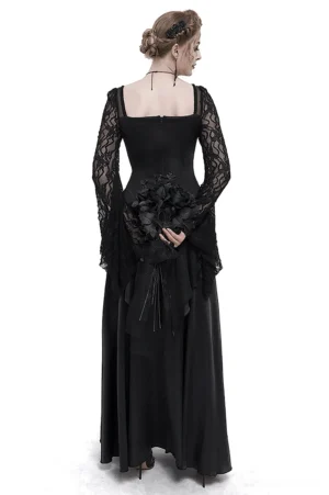 Gothic black evening dress with lace sleeves and open back design - rear view on model