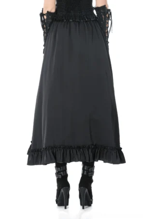 Black gothic maxi skirt with ruffled hem worn from behind, rear view of flowing silhouette with burgundy lace detail