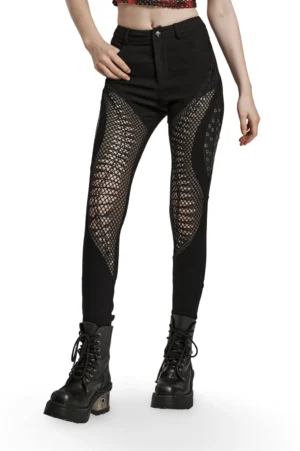 Black gothic mesh hollow skinny trousers with fishnet thigh cutouts, front three-quarter view on female model, alternative fashion pants with burnt pattern weaving