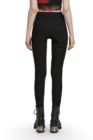 Black gothic mesh trousers rear view, back full-body shot of slim-fit punk pants with asymmetrical fishnet cutouts on thighs