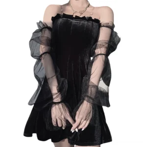 Black off-shoulder gothic mini dress with mesh puff sleeves front view on model, velvet fabric with sheer transparent sleeves, empire waist fit and flare silhouette