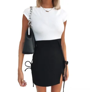 Black gothic mini skirt with adjustable shoulder straps front view on female model