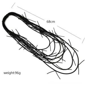 Gothic spike rope necklace flat lay top-down view showing 68cm length, intricate rope construction with evenly distributed spike accents, matte black texture detail