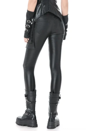 Black gothic pants rear view showing back pockets and adjustable buckle strap details on model