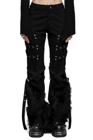 Black gothic straight pants with faux fur trim and mesh panels - front view on model